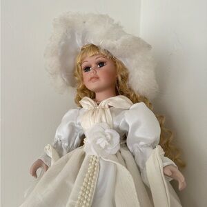 Porcelain Collectible Doll in White Satin Dress